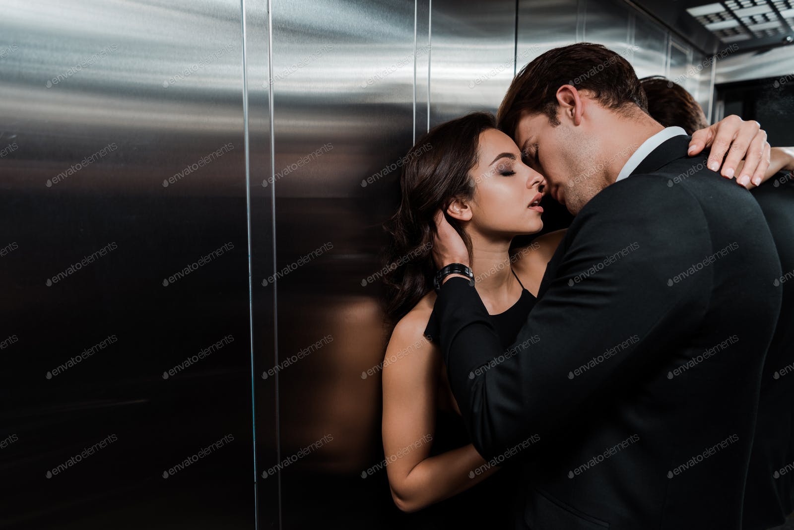 man woman sex in elevator