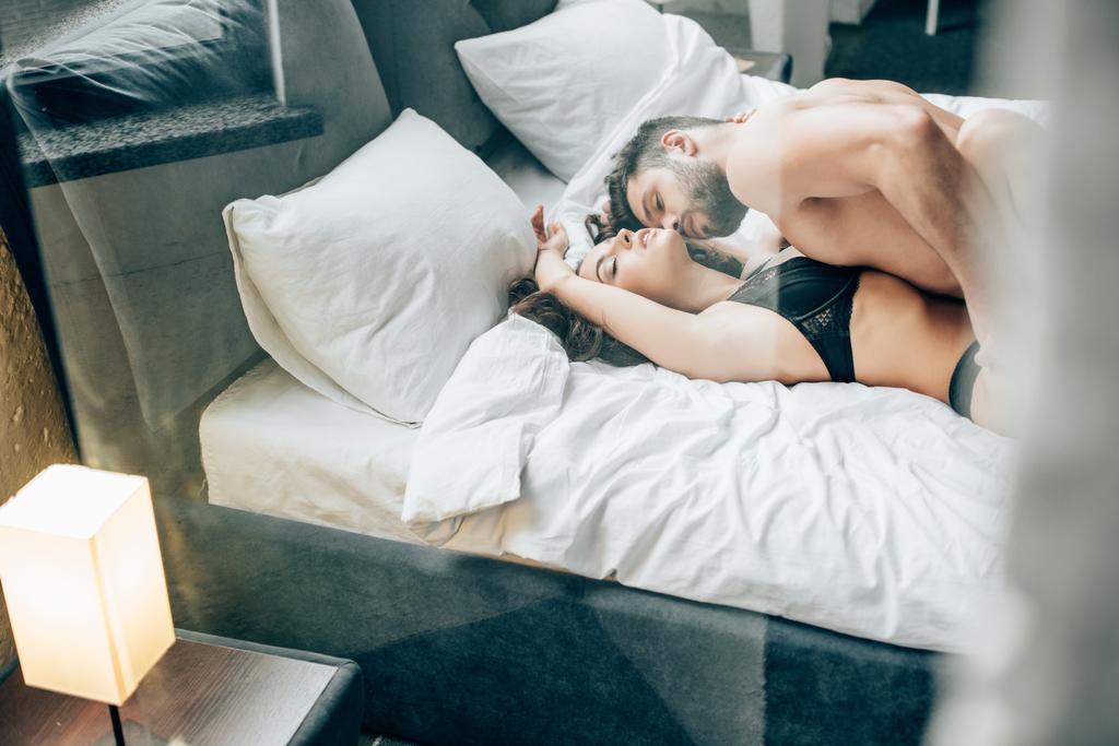 bearded-shirtless-man-kissing-passionate love sex
