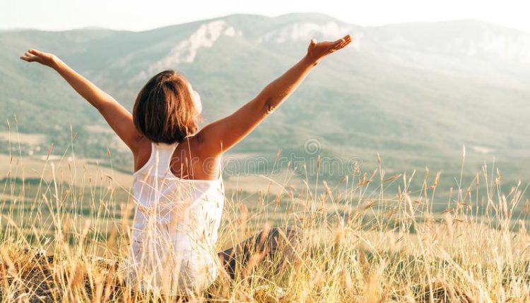 happy-woman-meets-sunrise-mountain-151970336