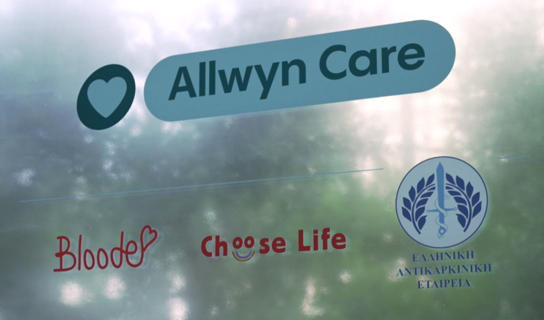 Λογότυπο του Allwyn Care μαζί με τα λογότυπα των οργανισμών Bloode, Choose Life και Ελληνική Αντικαρκινική Εταιρεία, στο πλαίσιο δράσεων πρόληψης και εθελοντικής προσφοράς για την υγεία.
